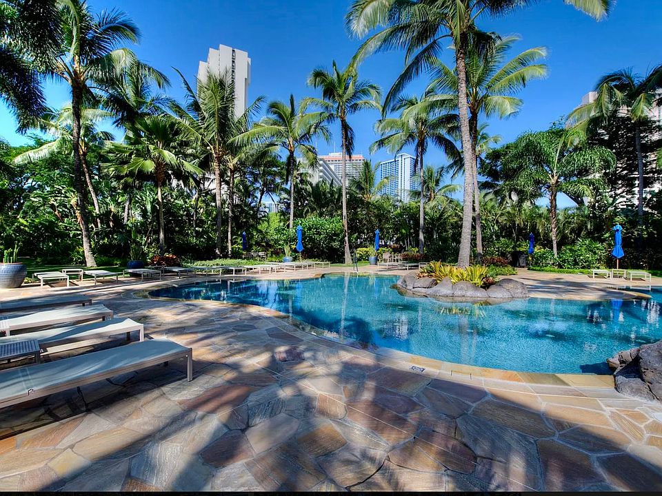 Pool and spa with lounge area