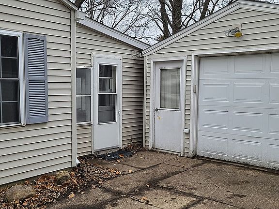 Porch entrance and garage 