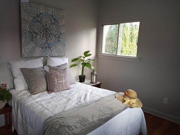 This bedroom looks has mountain- view out the front and church-view on the side.