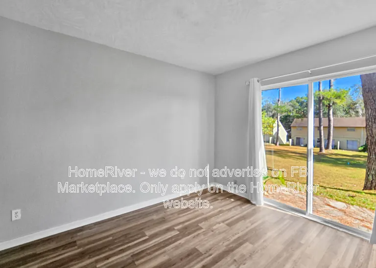 11559 SE 57th Ct — Photo 6