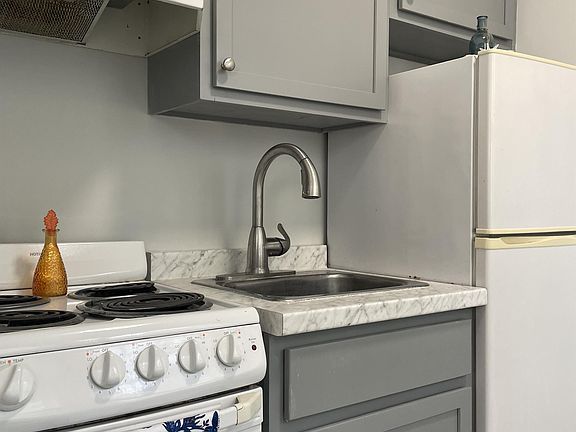 Updated kitchen cabinets and all electric appliances