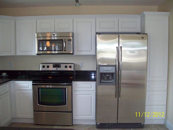side by side - range/oven and microwave