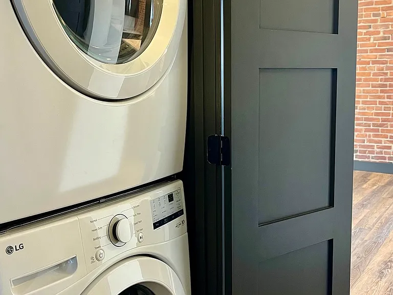 Unit comes with an electric washer and dryer.