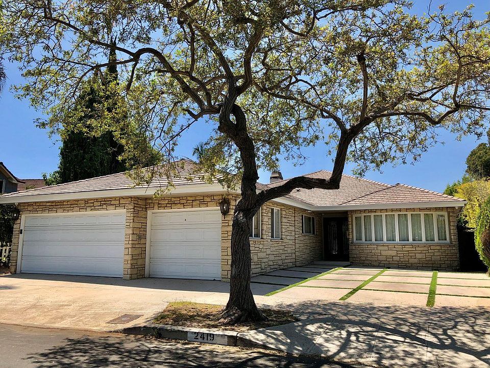 Home is on a beautiful tree lined cul de sac