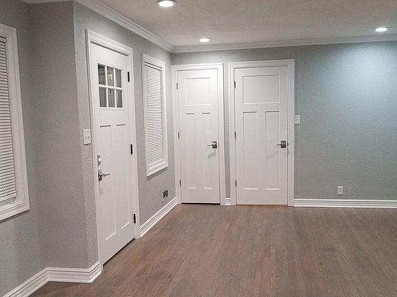 Living room. Hall closet, garage/basement access.