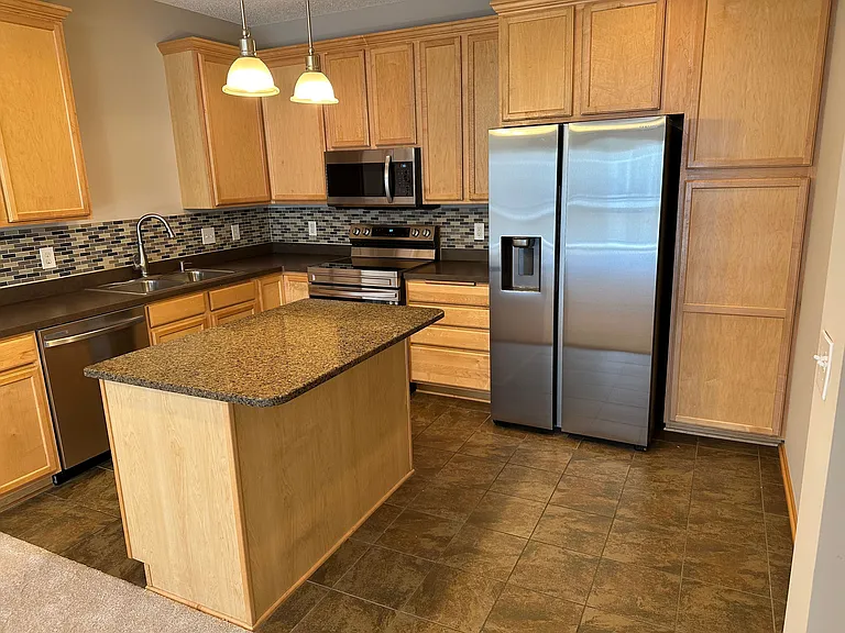 Kitchen with SS Appliances
