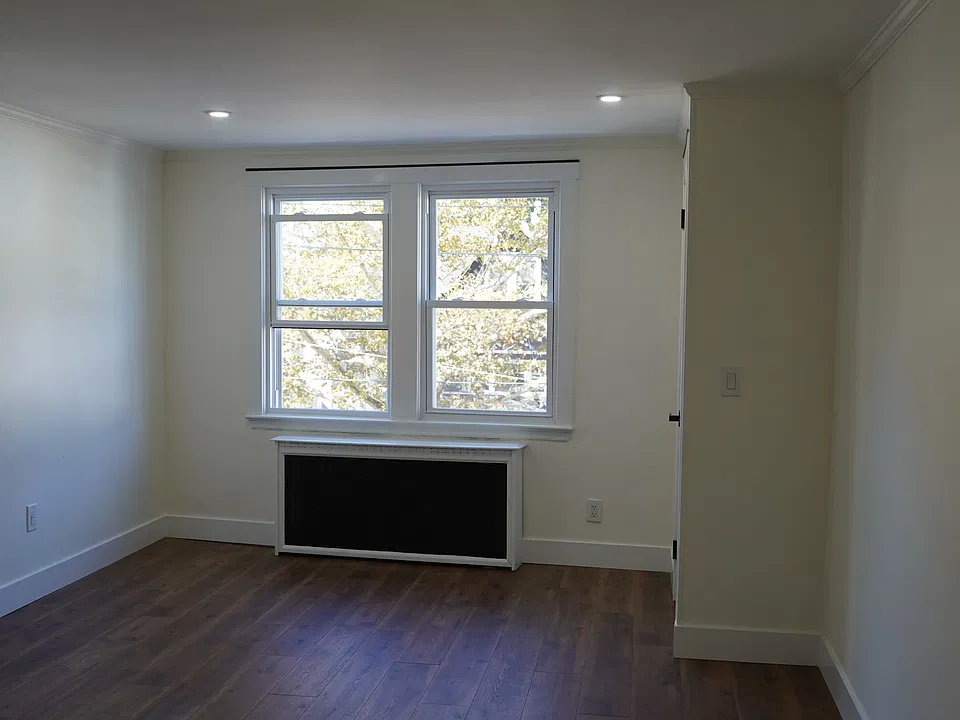 Living room facing Main St pic 1