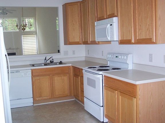 Kitchen looks into Greatroom