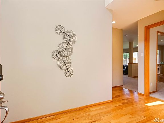Entryway featuring solid oak flooring.  Come on in and look around!