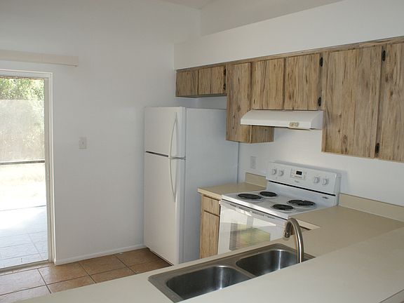 BREAKFAST BAR LOOKING INTO KITCHEN
