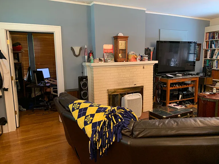 Living room with working wood burning fireplace