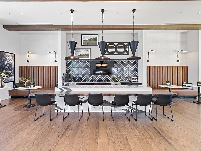 Cook, dine, or connect in this modern community kitchen with lounge-style seating.