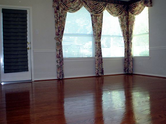 Hardwoods and Private Door to Backyard in Master