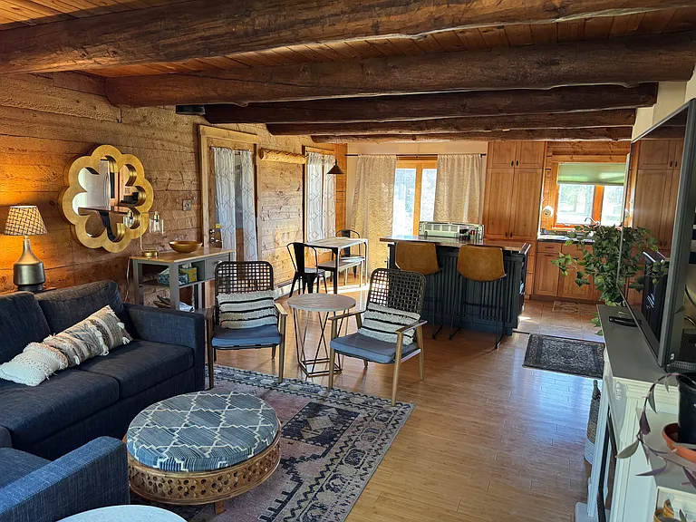 Living room looking through dining area and kitchen