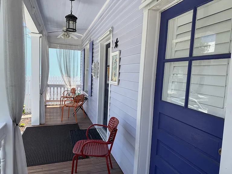 Enjoy people watching, reading a book or lemonade sipping on this oversized front porch.
