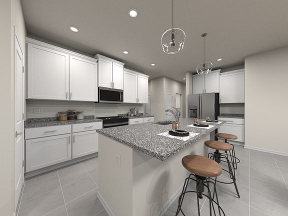 Create gourmet meals in the open concept kitchen.