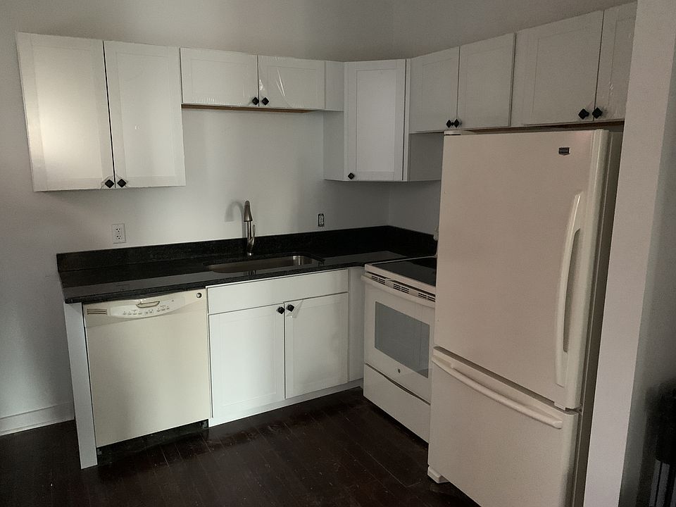 Kitchen with granite counters and updated appliances
