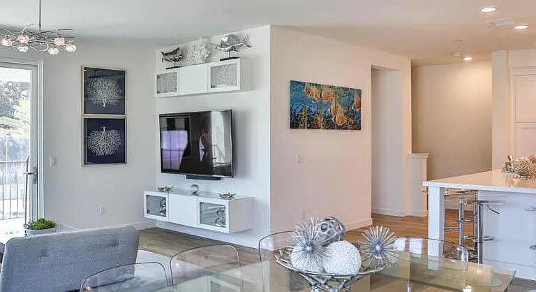 Open plan kitchen, dining and living area with views or the ocean