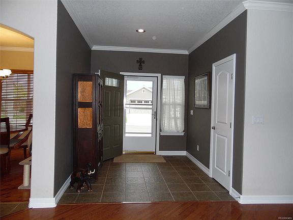 Welcoming Entry Way w/ Natural Stone.