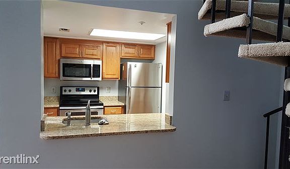 Updated Stainless Steel & Granite Kitchen