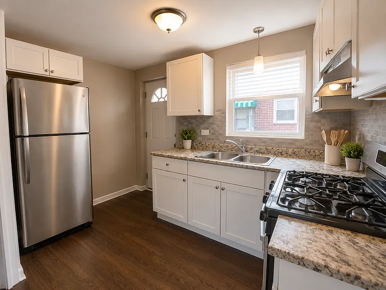 8153 S Colfax Ave — Photo 2