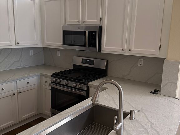 3rd image of 11595 Compass Point Dr N Unit 7