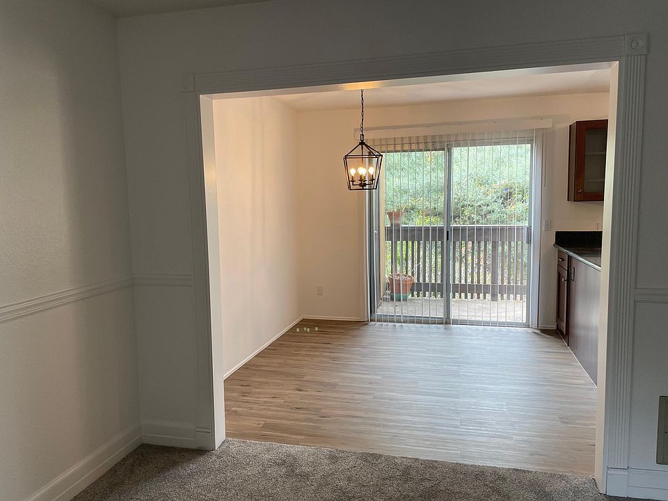 Dining room w/ new lighting and flooring