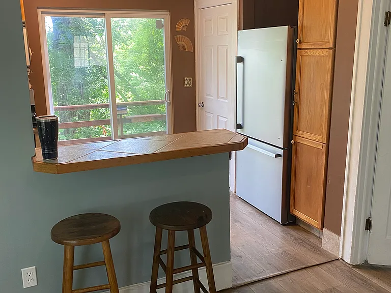 Living room looking into kitchen