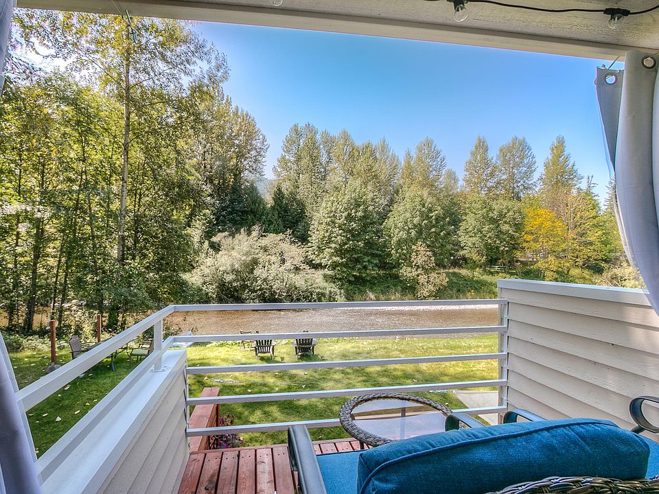 Master bedroom balcony overlooking the river.