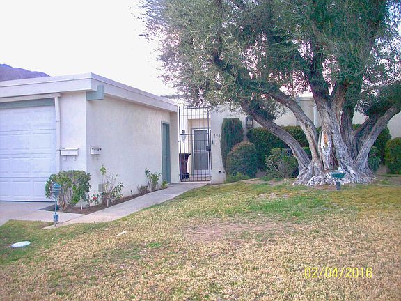 Front yard entrance view & garage