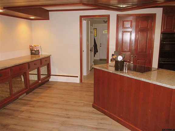 Handy built-in side board...great serving space for parties.