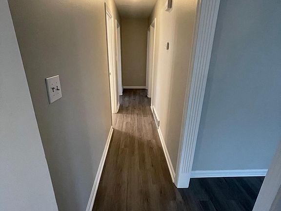 Hallway leading to bathroom and bedrooms