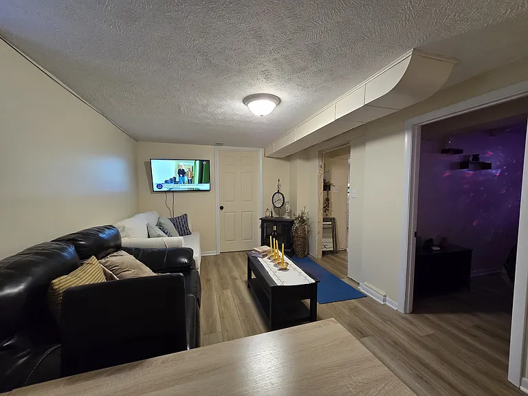 Beautifully maintained interior with contemporary finishes, cozy seating area, and peaceful private atmosphere.