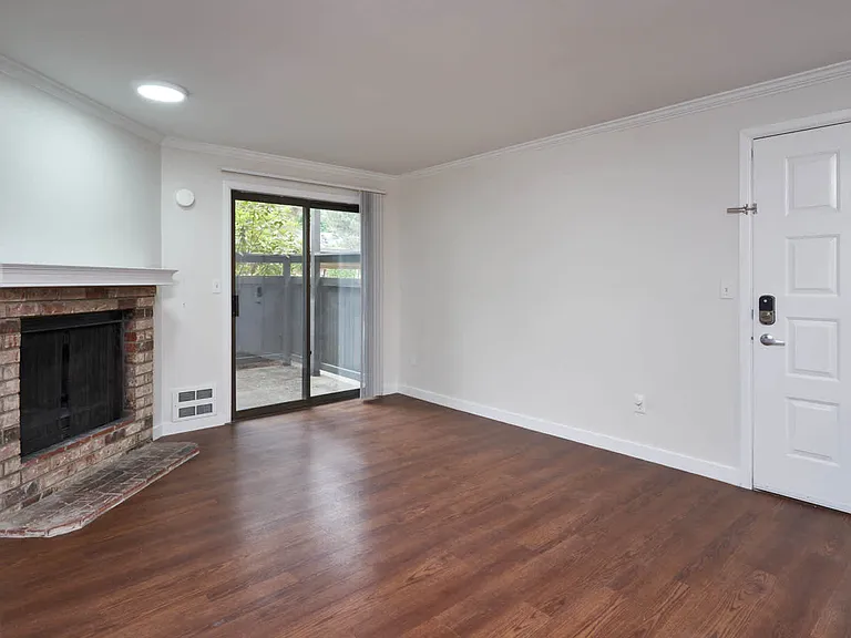 Living Room with Fireplace and Patio
