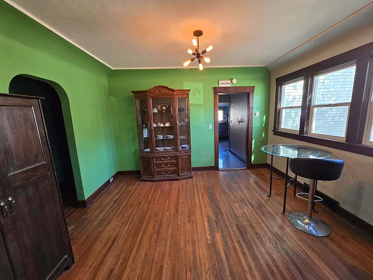 A long bank of big windows make this large room airy and bright. This is the hub of the home.