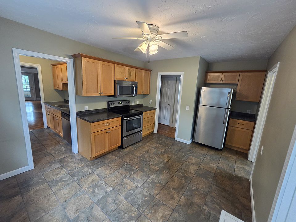 Updated kitchen with stainless steel appliances.