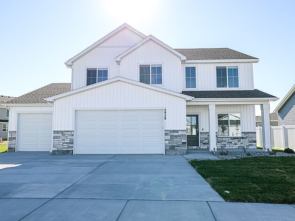 Farmhouse Elevation with added 3rd Car Garage