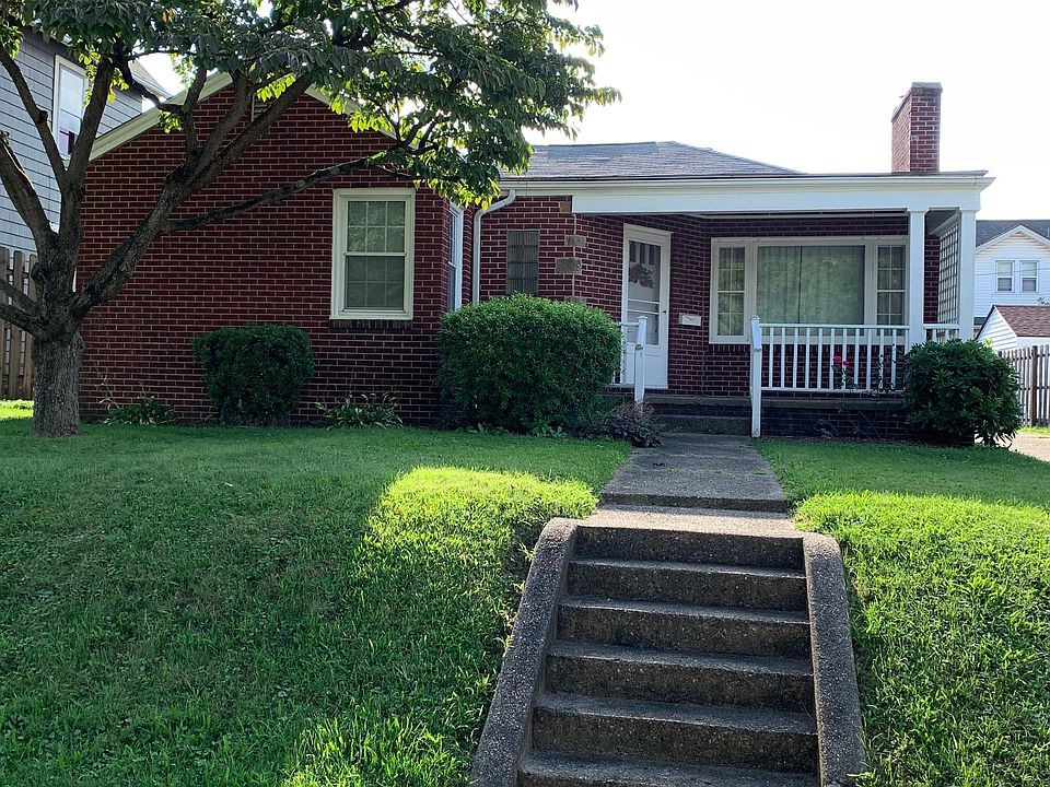 Brick Bungalow with charming front porch.