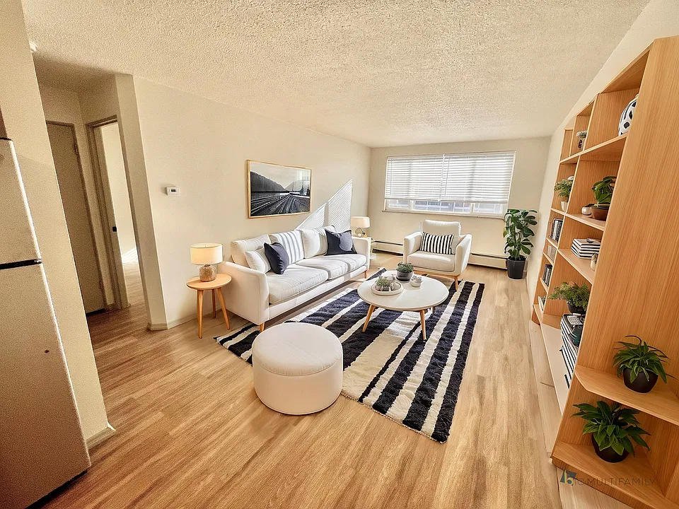 Step into a warm and stylish living space designed for relaxation.