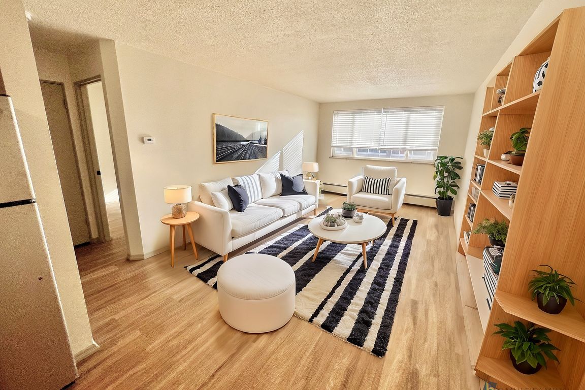 Step into a warm and stylish living space designed for relaxation.