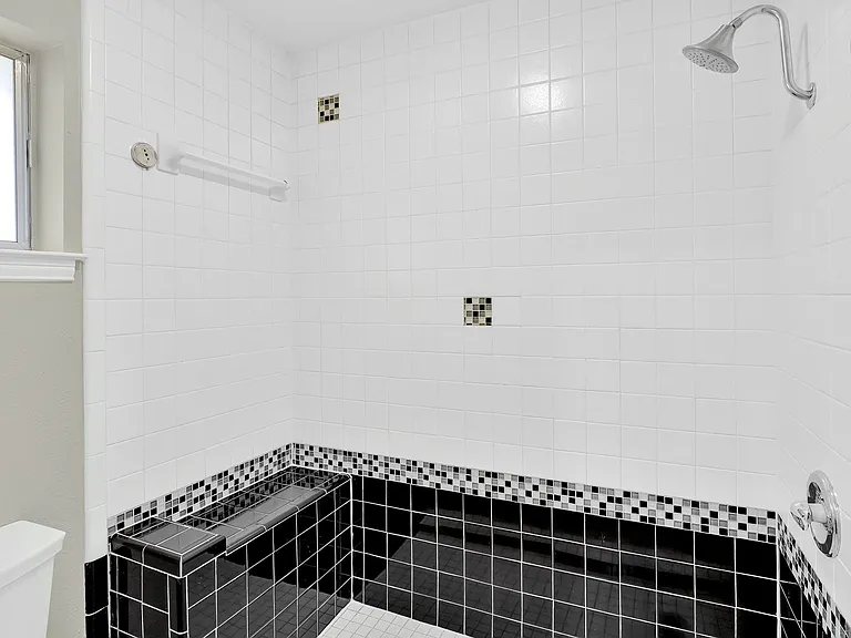 Primary bathroom with large walk in shower.