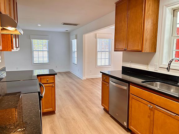 Cherry cabinets, granite countertops, Stainless steel appliances.