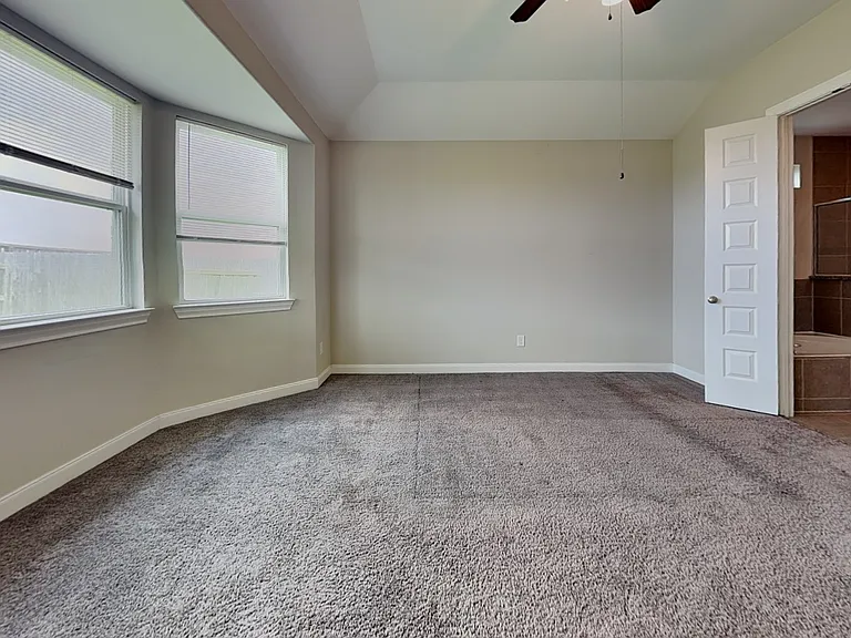 Spacious bedroom with ample na