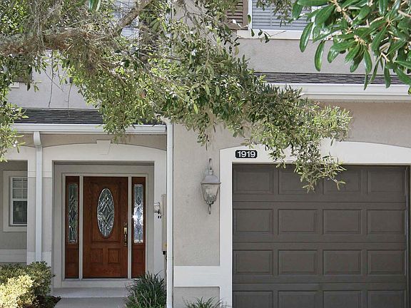FRONT ENTRANCE AND GARAGE
