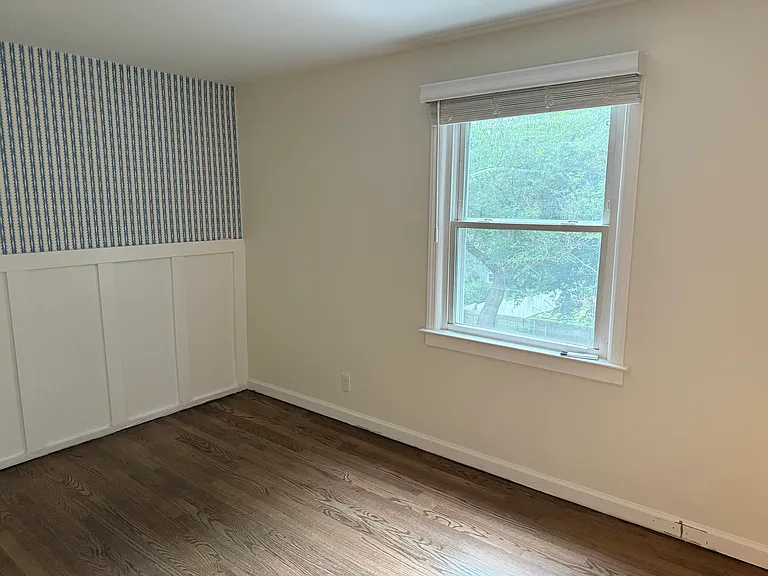 Bedroom 2, perfect for a child's room or office, includes closet