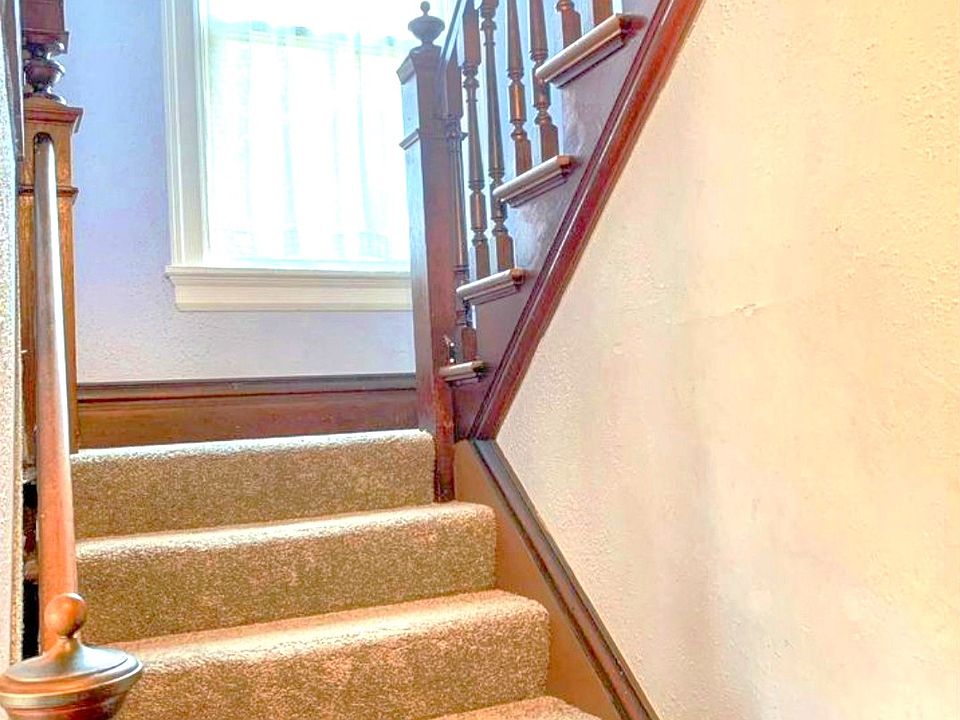 There is an amazing built-in on the way UP the stairs!
