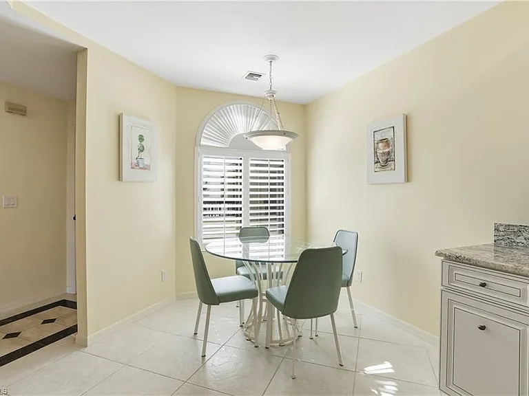 7048 Pelican Bay Blvd #C-302 — Photo 16