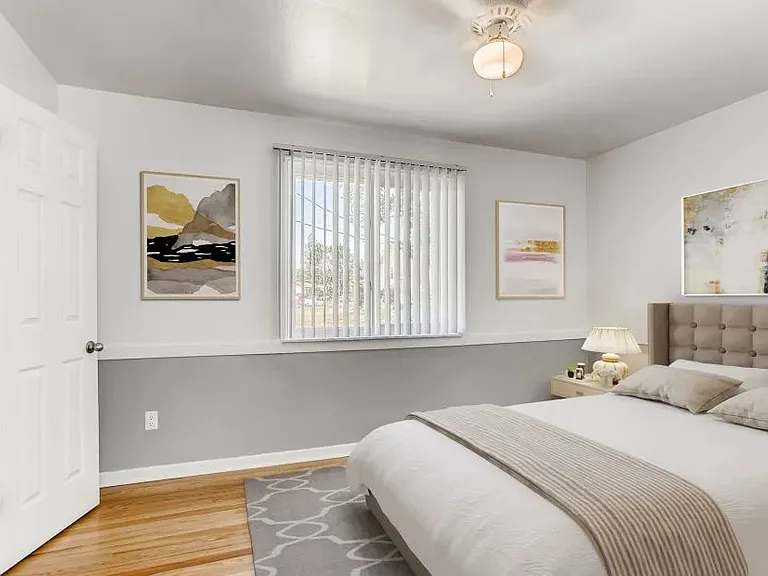 model bedroom with modern look in model home with window