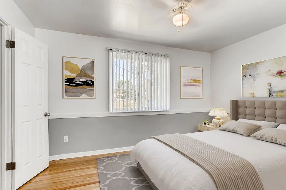 model bedroom with modern look in model home with window