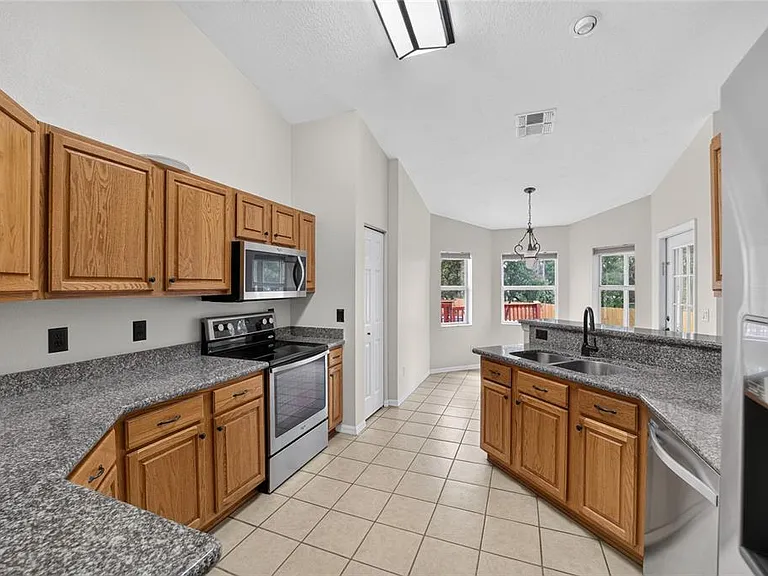 10384 SW 41st Ct — Photo 23